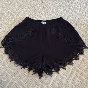 Women’s black shorts with lace trim, size small